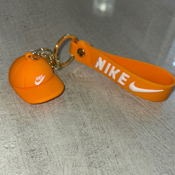 Nike Other - Nike Gold and Orange Cap Keychain